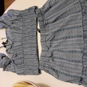 New two piece outfit. Skirt with midriff shirt. Very cute!